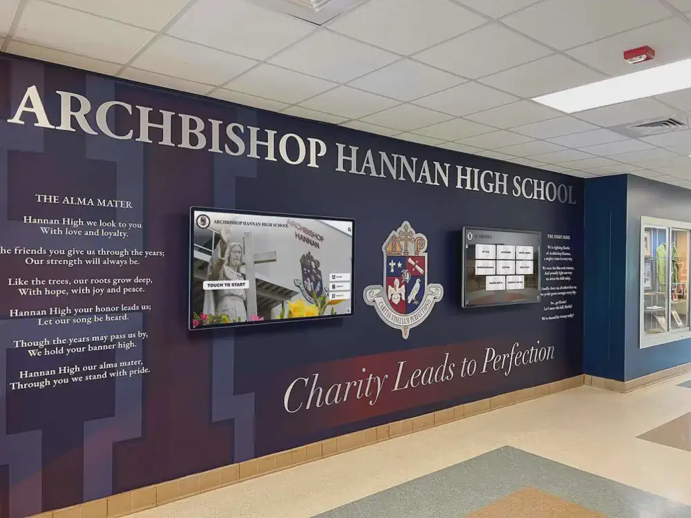 Interactive touchscreen archive display showcasing school historical records